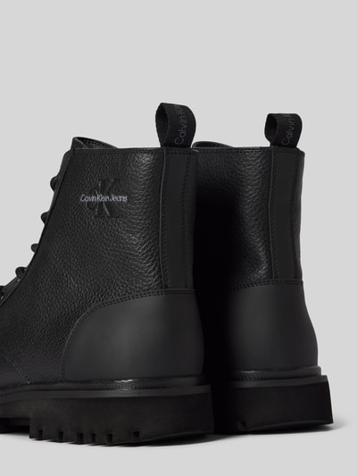 Peek & Cloppenburg Calvin Klein JeansChelsea Boots mit Label-Detail in black Im Verkauf