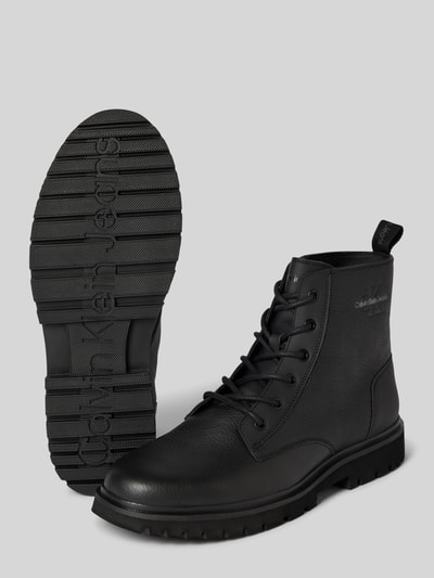 Peek & Cloppenburg Calvin Klein JeansChelsea Boots mit Label-Detail in black Im Verkauf