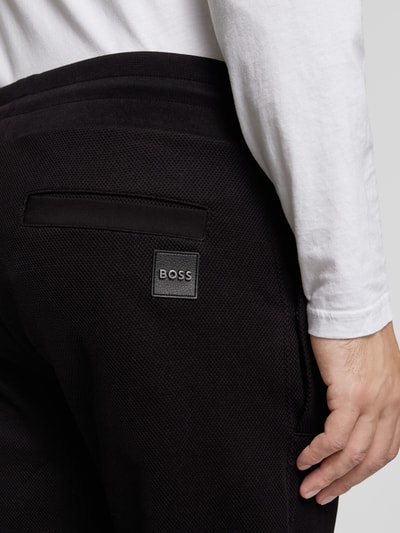 Peek & Cloppenburg BOSSSlim Fit Sweatpants mit Strukturmuster Modell 'Lamont' in black Outlet
