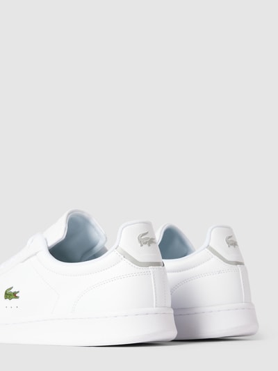 Peek & Cloppenburg LacosteSneaker mit Label-Print und Logo-Stitching Modell 'CARNABY' in weiss Bis zu 55% Rabatt