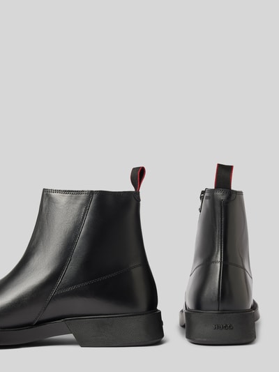 Peek & Cloppenburg HUGOBoots aus Leder mit Reißverschluss in black Vatertagsangebot